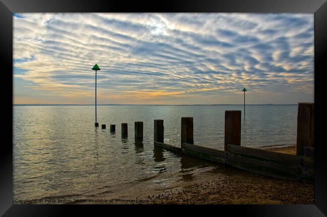Unusual cloud formations over the Thames Estuary at Westcliff, Essex. Framed Print by Peter Bolton