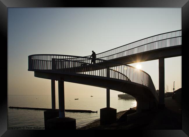 An 'abstract style' footbridge in silhouette at Leigh on Sea, Essex, UK. Framed Print by Peter Bolton