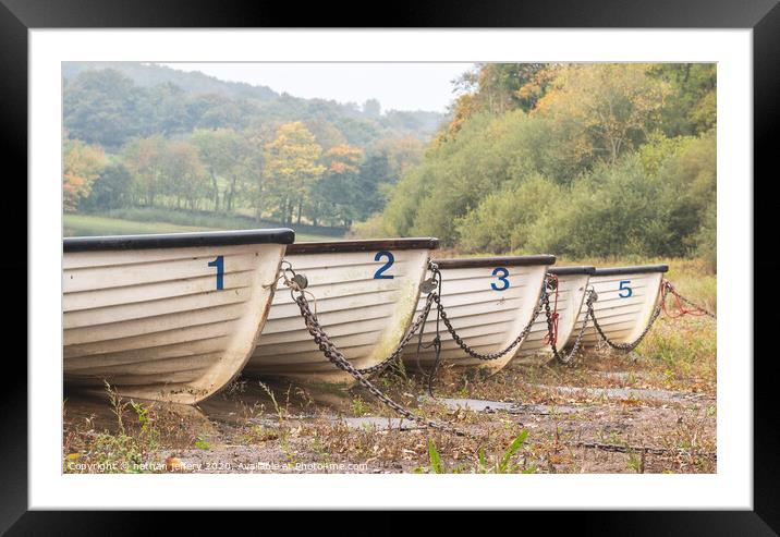 Boats Chained up at the side of the lake Framed Mounted Print by nathan jeffery
