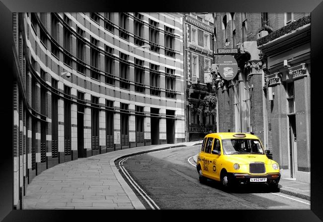 Yellow Taxi in London Framed Print by Jim Hughes