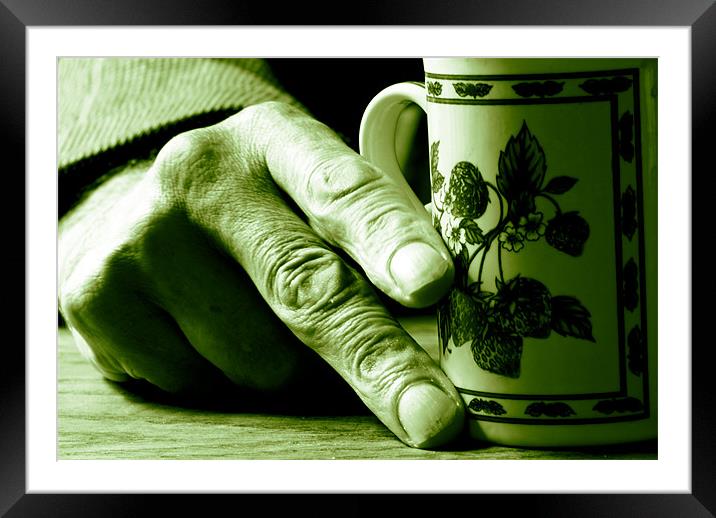 Hand on mug Framed Mounted Print by Nathan Wright