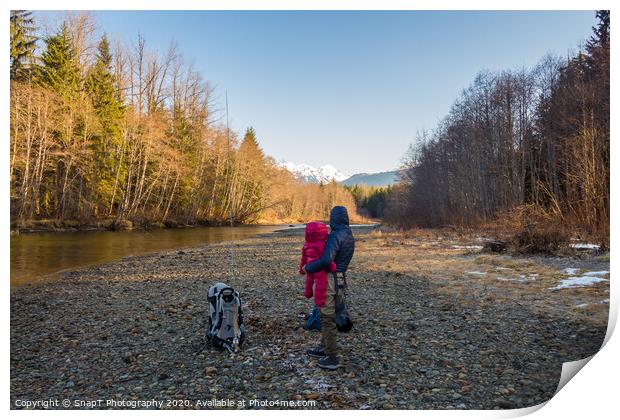 A mother and daughter looking at mountains in the spring morning sun Print by SnapT Photography