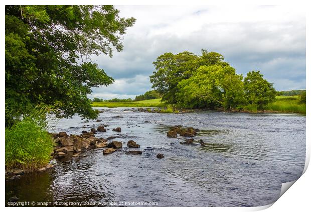 A rocky riffle under trees on a summers day on the Print by SnapT Photography