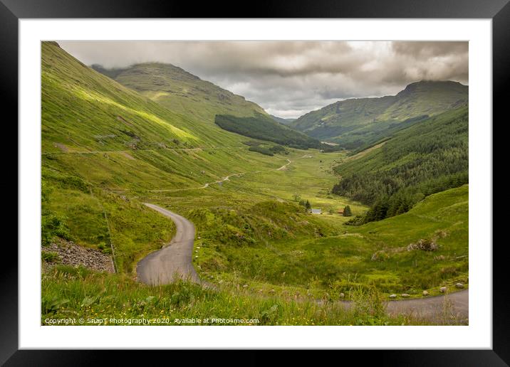A view down a Scottish highland glen from the 'Res Framed Mounted Print by SnapT Photography