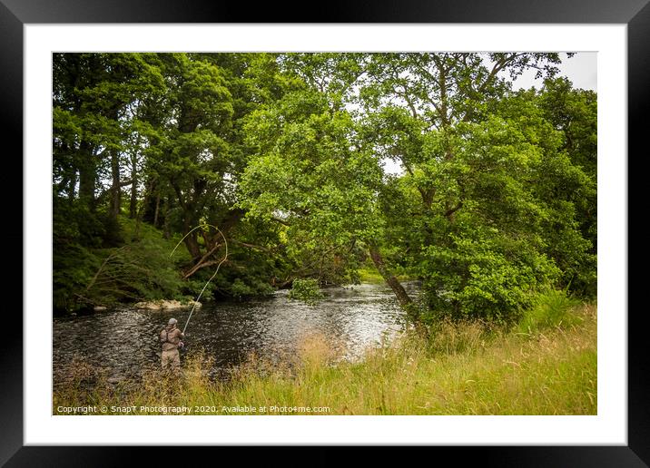 A fisherman spey casting for salmon using a fly ro Framed Mounted Print by SnapT Photography