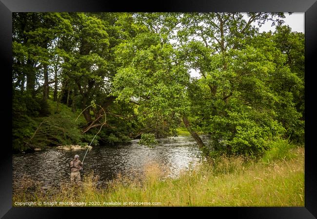 A fisherman spey casting for salmon using a fly ro Framed Print by SnapT Photography