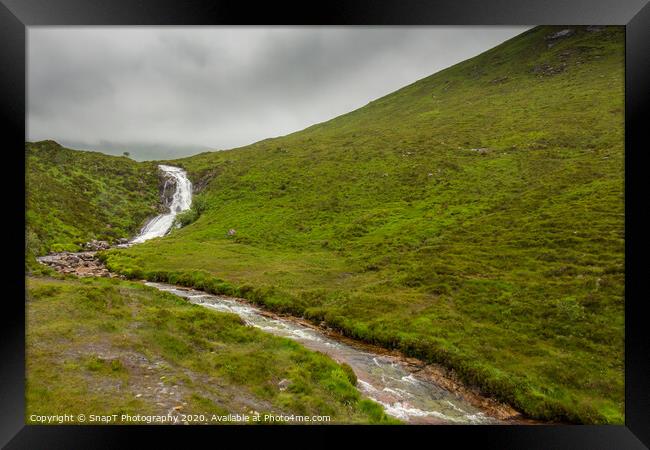 A waterfall and fast flowing highland stream on the isle of Skye, Scotland Framed Print by SnapT Photography
