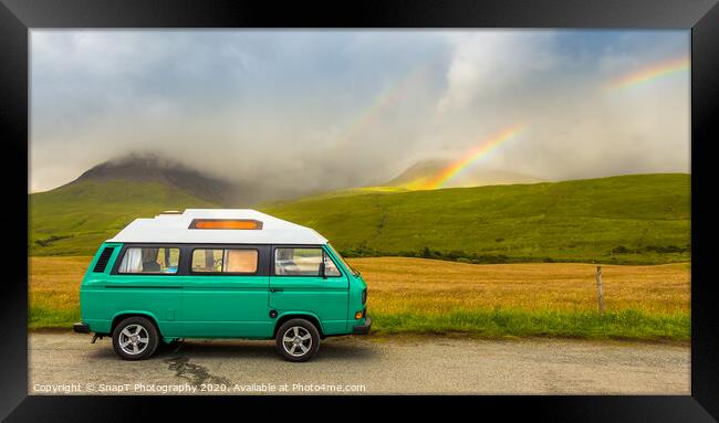 An old green camper van in the shadow of misty mountains and a rainbow Framed Print by SnapT Photography