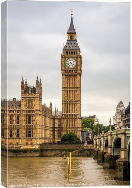 Big Ben by Westminster Bridge and the River Thames on a cloudy day in London Canvas Print by SnapT Photography