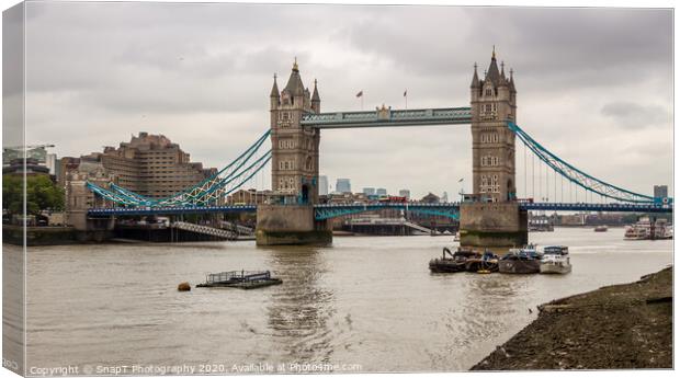 The historic Tower Bridge on the River Thames on a cloudy day in London Canvas Print by SnapT Photography