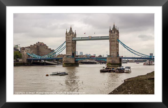 The historic Tower Bridge on the River Thames on a cloudy day in London Framed Mounted Print by SnapT Photography