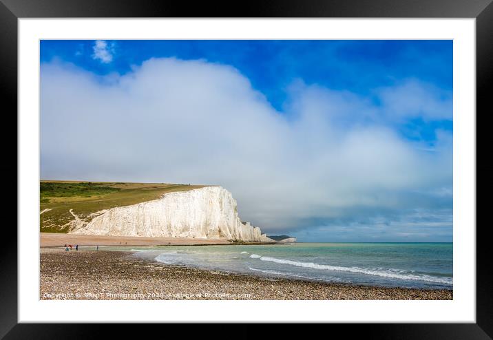 Dramatic white cliffs, blue sky and shingle beach  Framed Mounted Print by SnapT Photography