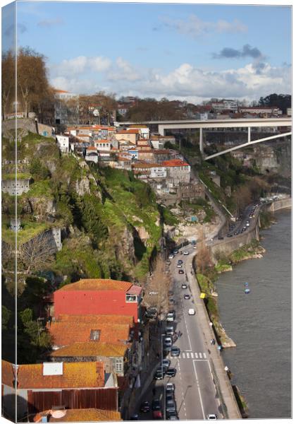City of Porto in Portugal along Douro River Canvas Print by Artur Bogacki