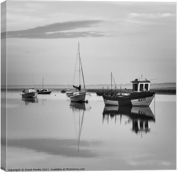 Morning Reflections at Brancaster Staithe Norfolk  Canvas Print by David Powley