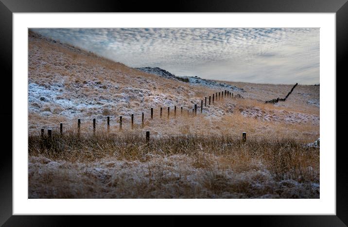 Snow capped posts in Penwyllt Framed Mounted Print by Leighton Collins