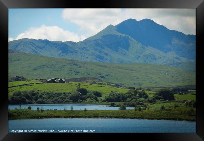 View across Snowdonia from Capel Curig Framed Print by Simon Marlow