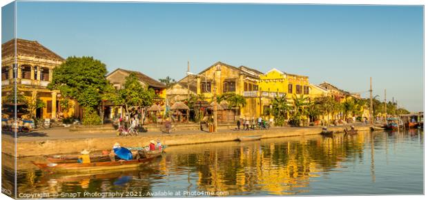 The ancient town of Hoi An in Vietnam, reflecting on the water Canvas Print by SnapT Photography