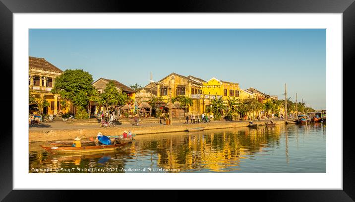The ancient town of Hoi An in Vietnam, reflecting on the water Framed Mounted Print by SnapT Photography