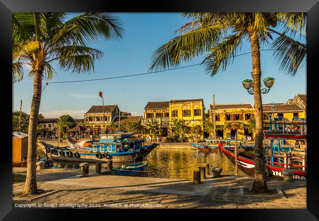 A view across the river from the south bank in Hoi An Vietnam, Framed Print by SnapT Photography