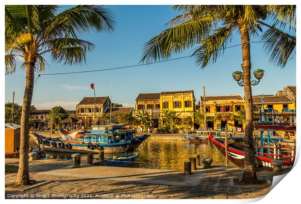 A view across the river from the south bank in Hoi An Vietnam, Print by SnapT Photography