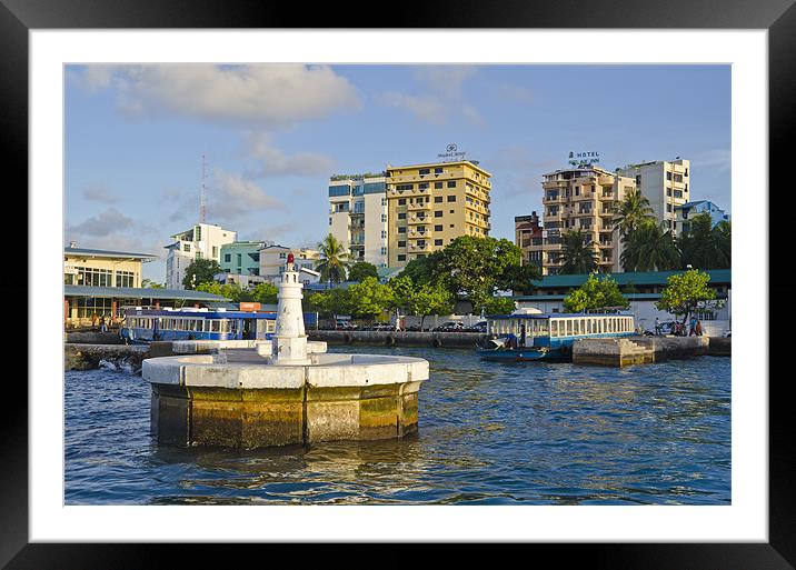 Male inner harbour Framed Mounted Print by Hassan Najmy