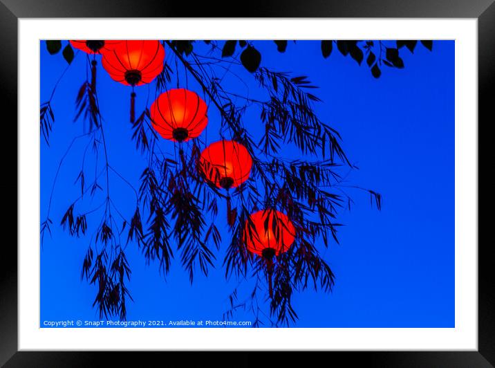 Red vietnamese or chinese lanterns contrasting with a blue sky Framed Mounted Print by SnapT Photography