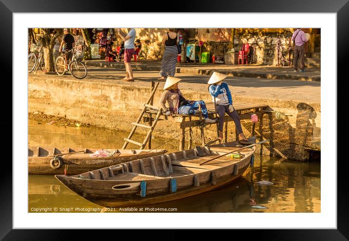 Two vietnamese ladies with conical hats relaxing by the river Framed Mounted Print by SnapT Photography