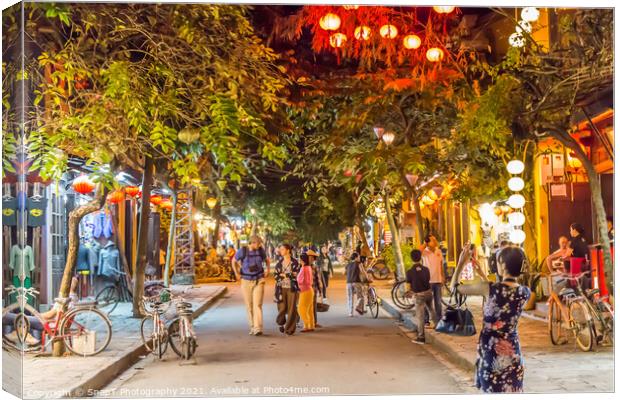 Le loi street at night, with lanterns, trees and suit shops, Hoi An, Vietnam - January 10th, 2015 Canvas Print by SnapT Photography