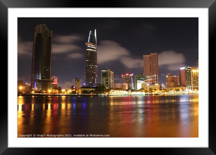 Long exposure and reflection of the Ho Chi Minh City skyline at night Framed Mounted Print by SnapT Photography