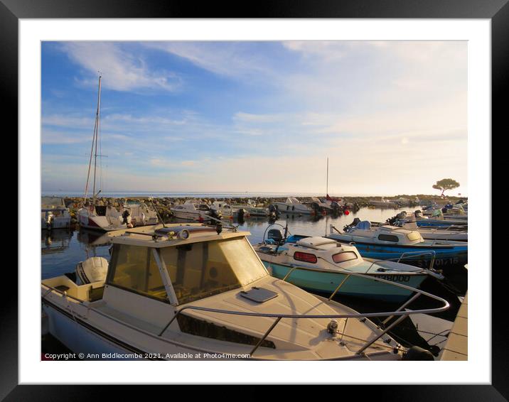 Boats at Meze in the sunset Framed Mounted Print by Ann Biddlecombe