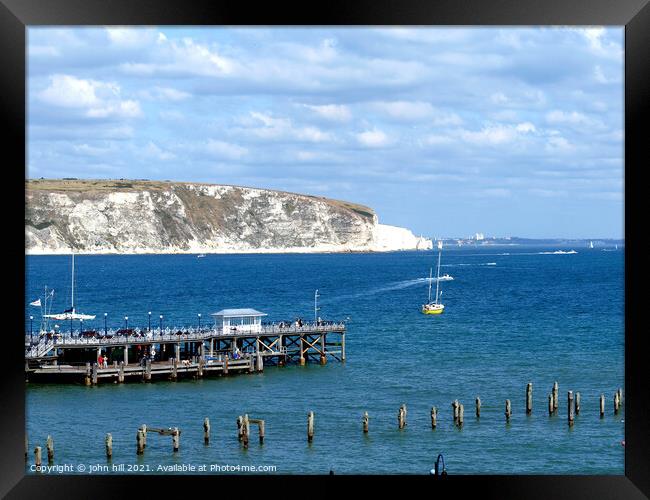 Old  & New piers at Swanage in Dorset. Framed Print by john hill