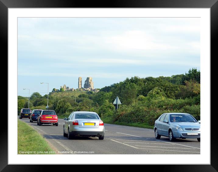 Corfe Castle as seen from the road. Framed Mounted Print by john hill