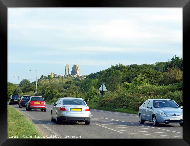 Corfe Castle as seen from the road. Framed Print by john hill