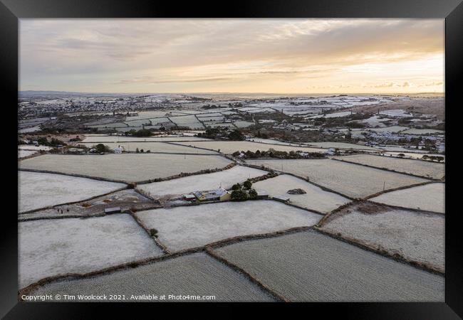 Early morning flight around Carn Brea, Redruth, Cornwall Framed Print by Tim Woolcock