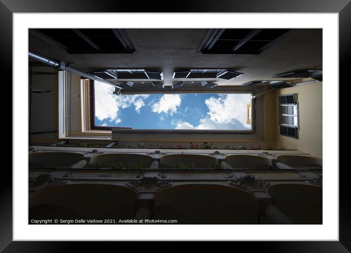 the sky from the courtyard  Framed Mounted Print by Sergio Delle Vedove