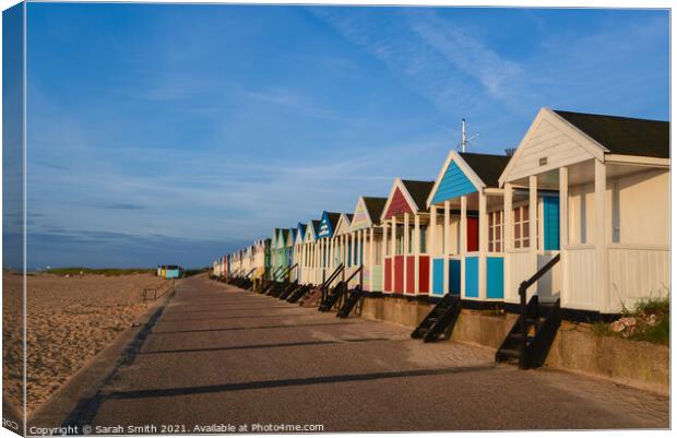 Colourful Beach Huts at Southwold Canvas Print by Sarah Smith