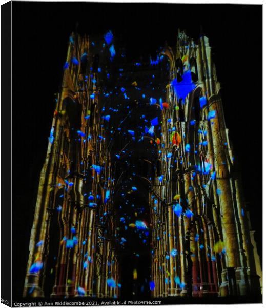 Disguised in colorful lights is Amiens Cathedral Canvas Print by Ann Biddlecombe