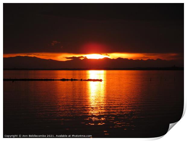 Sunset over the lake Print by Ann Biddlecombe