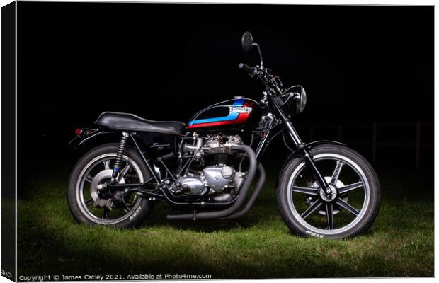 Classic Triumph at night Canvas Print by James Catley