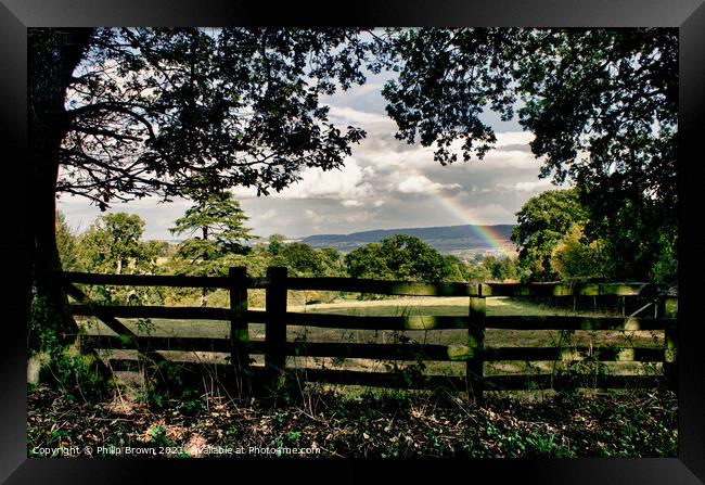 Rainbow over the fence & through the trees Framed Print by Philip Brown
