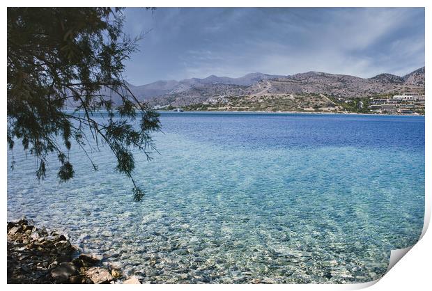 Crete or Kreta, Greece: View of the Mediterranean Sea against rocky terrain on Spinalonga island, formerly used as a leper colony, near Elounda, Mirabello Gulf Print by Arpan Bhatia