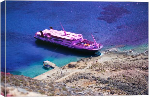 Crete, Greece: A cruise ship docked in Imeri Gramvousa in the small uninhabited islands off the coast of a peninsula also known Gramvousa Peninsula in the regional unit of Chania Canvas Print by Arpan Bhatia