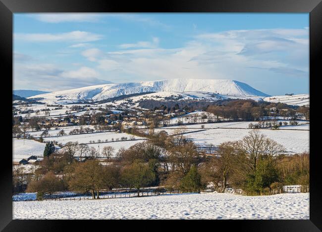Snow Covered Pendle Hill  Framed Print by Tony Keogh