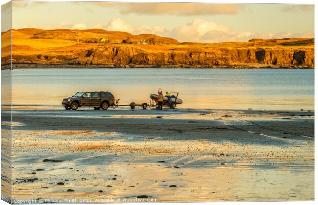 Launching a boat from Bharcasaig Beach. Canvas Print by Richard Smith