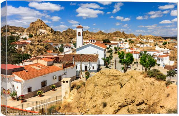 Cave house neighbourhood in Guadix Canvas Print by Kevin Hellon