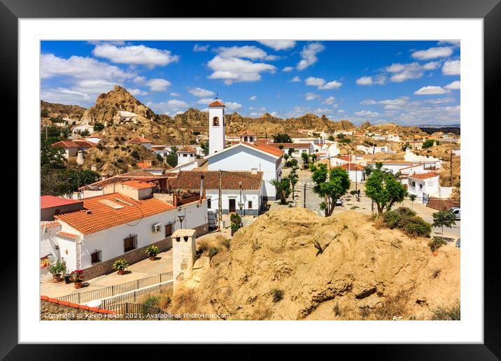 Cave house neighbourhood in Guadix Framed Mounted Print by Kevin Hellon