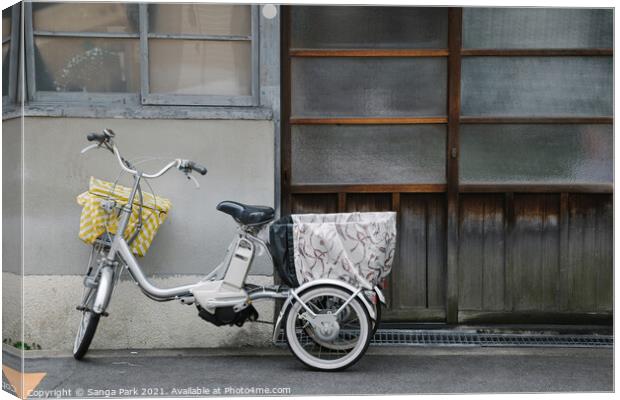 Bicycle and Japanese old house Canvas Print by Sanga Park