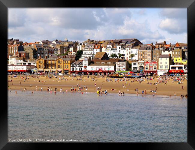 Scarborough seafront from the pier in August. Framed Print by john hill