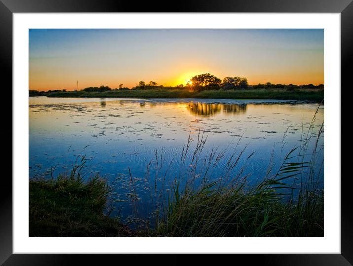 Sunset at he lake at Gunners Park, Shoeburyness, E Framed Mounted Print by Peter Bolton