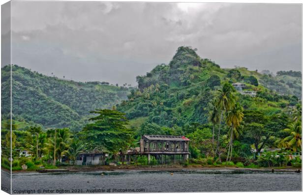 Abandoned huts on the coast, Near Kingstown, St. Vincent. Canvas Print by Peter Bolton